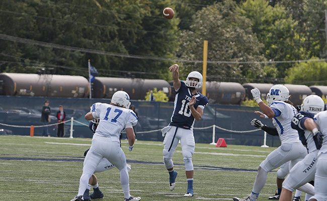 Taylor Masiewicz fires a pass in Saturday's 28-14 victory over Millikin.