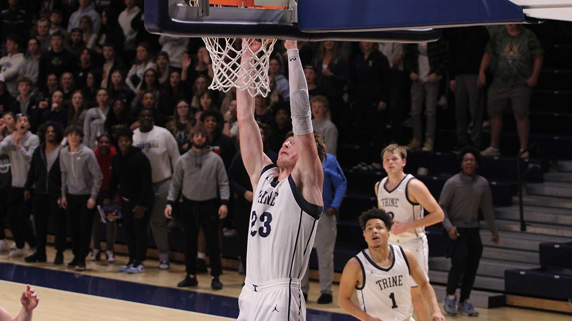 Battle on the Boards Leads to Trine Victory Against Manchester