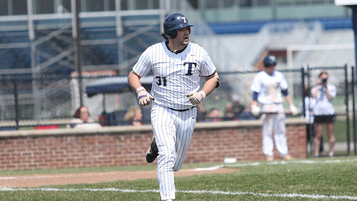 Trine Tops Manchester in Extra Innings
