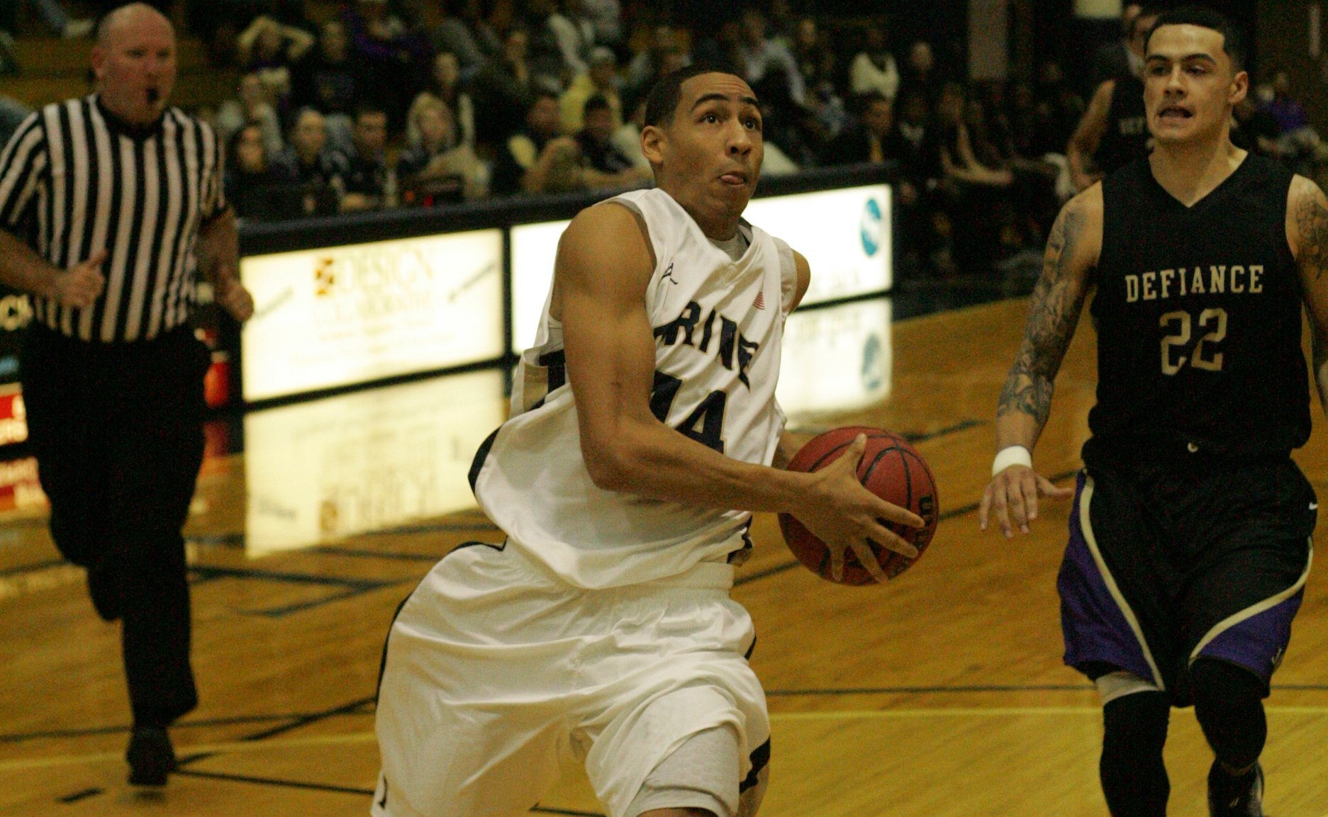 Yellow Jackets Pull Away Late to Defeat Trine Men
