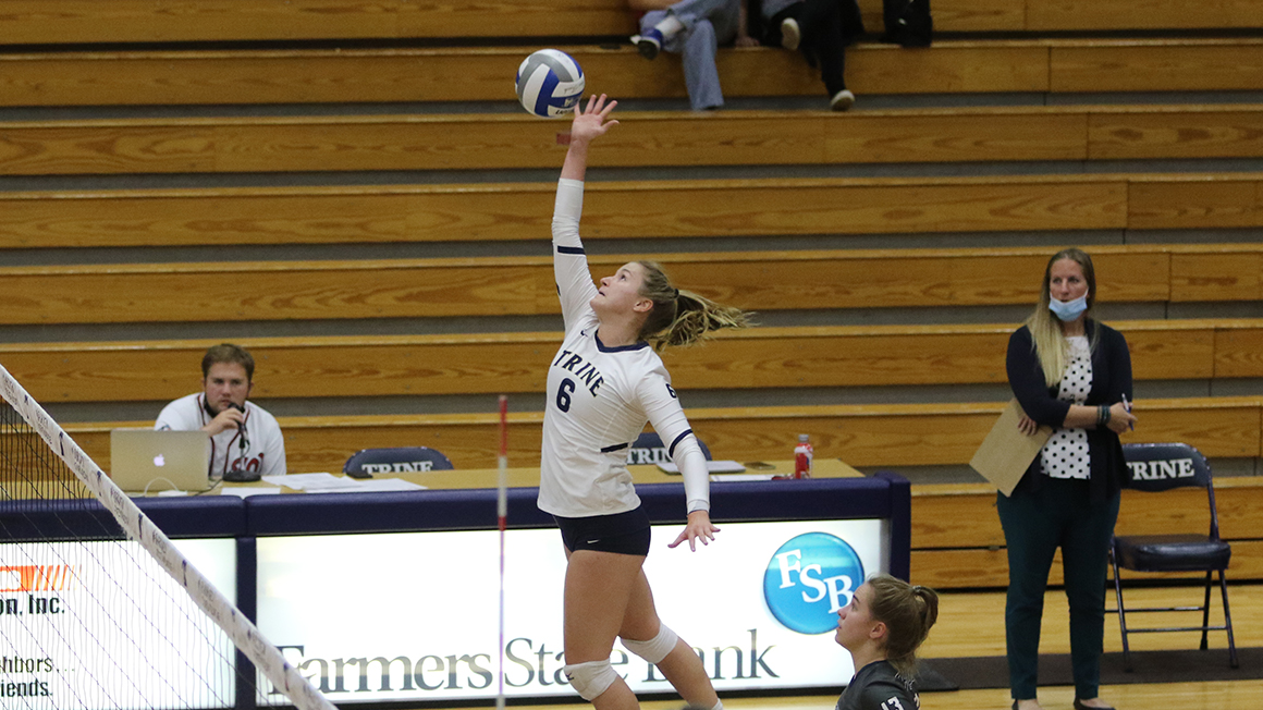 Trine Defeats Adrian in Straight Sets Wednesday